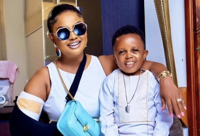 New Photos of Nana Ama Mcbrown Carrying Don Little Causes Stir On The Internet