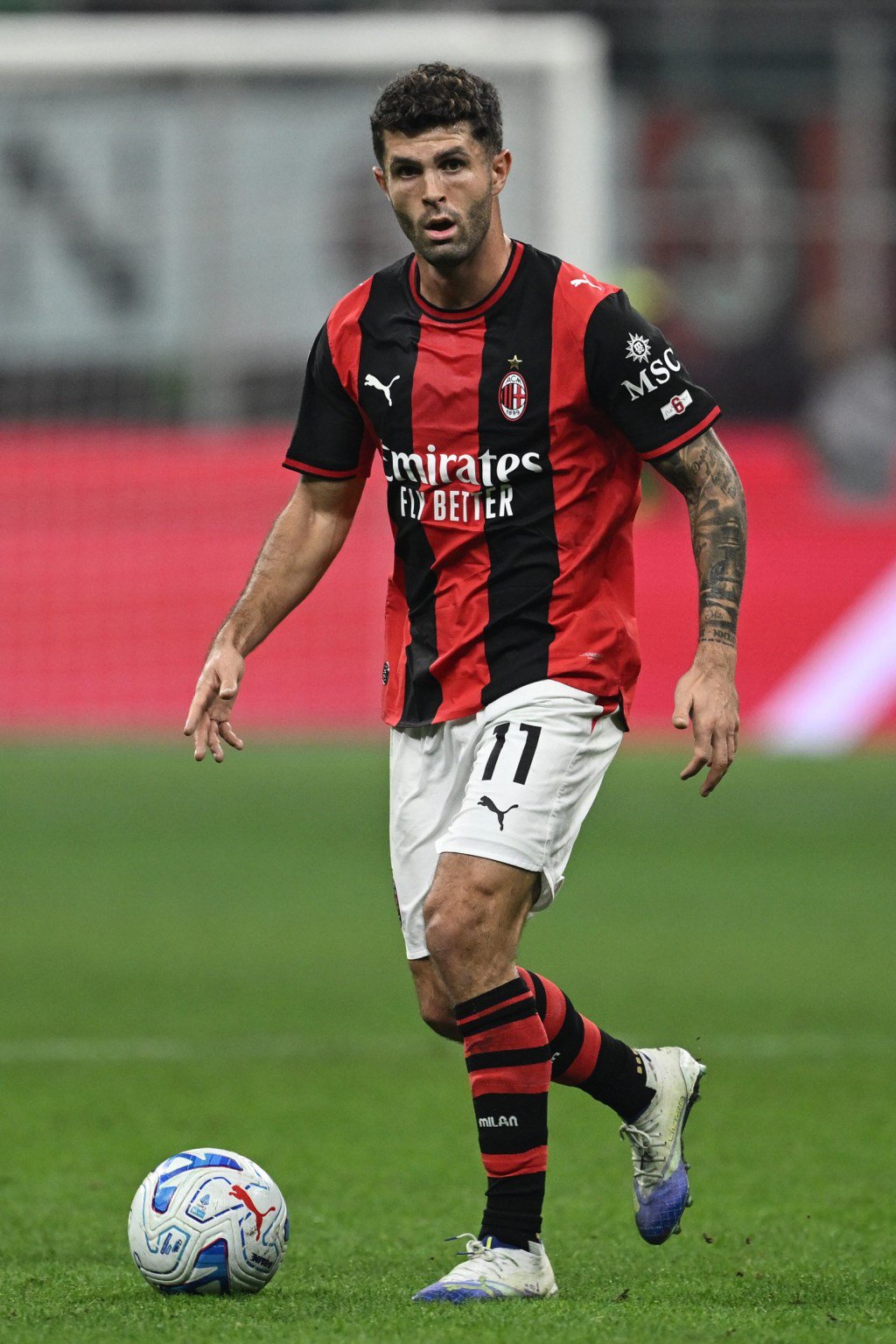 Christian Pulisic controlling the ball during the AC Milan match.