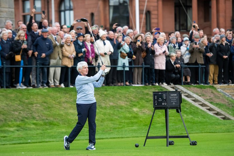 New captain of the R&A Golf Club at St Andrews Claire Dowling drives at the first hole of the Old Course. Photograph: R&A