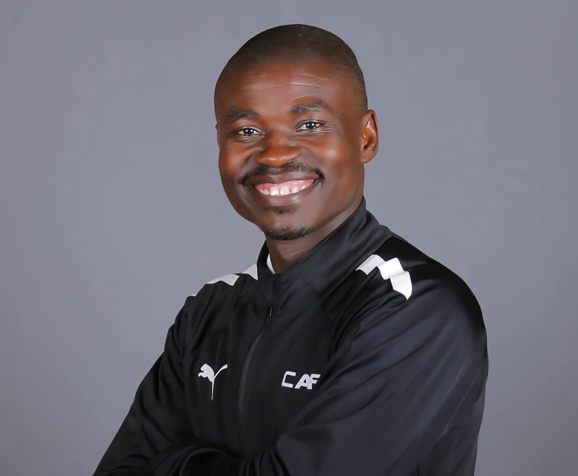 Jelly Chavani smiling during an official CAF photoshoot.