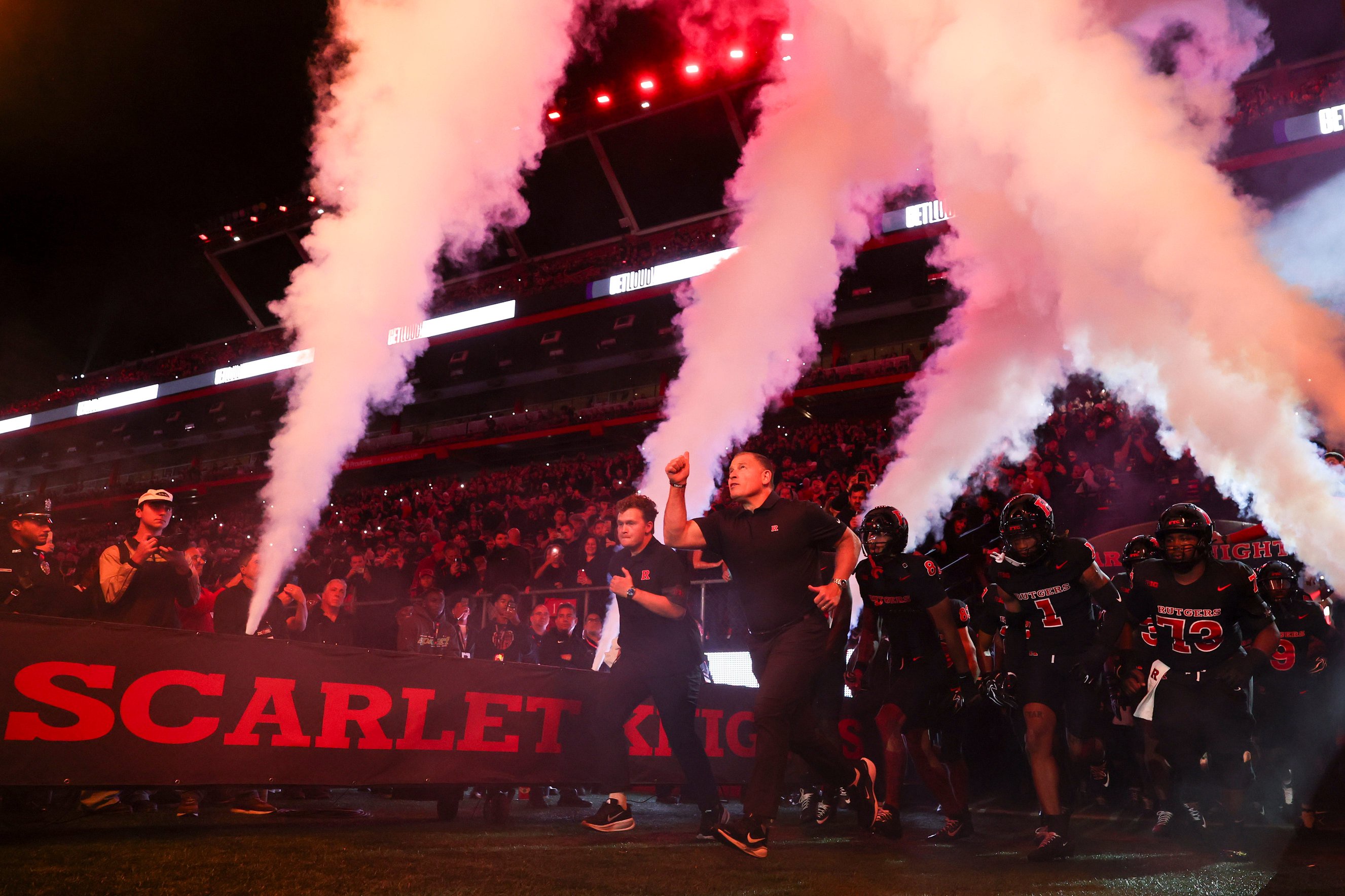 Head coach Greg Schiano of the Rutgers Scarlet Knights leads his team onto the field ahead of the game against the Indiana Hoosiers at SHI Stadium on October 03, 2026 in Piscataway, New Jersey.