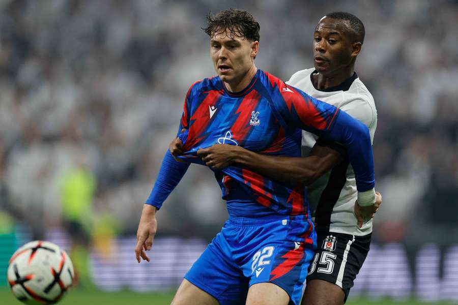 Crystal Palace's Jorgen Strand Larsen in action with Besiktas' Tiago Djalo