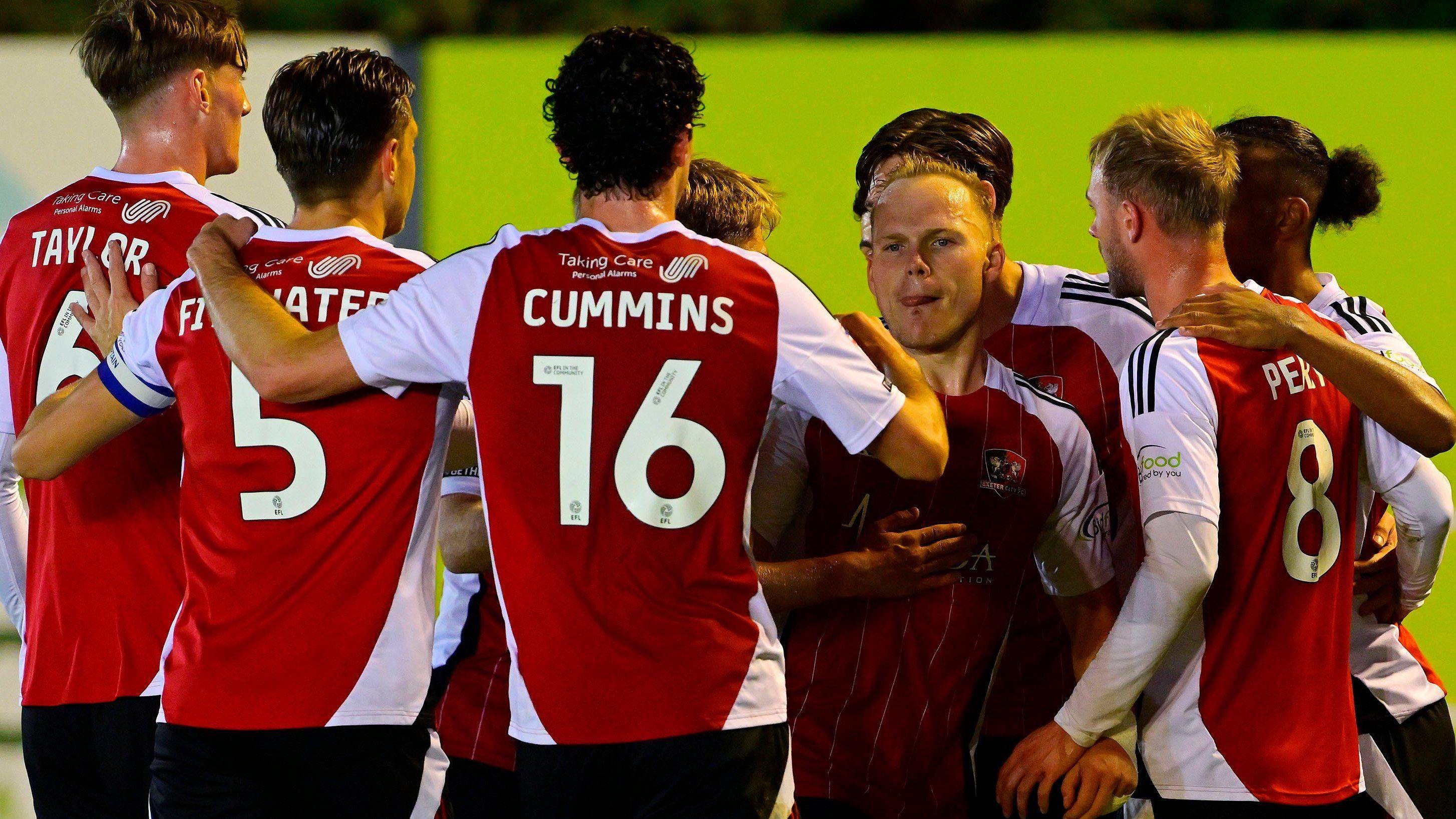 Exeter City celebrate Anthony Scully's first-half penalty