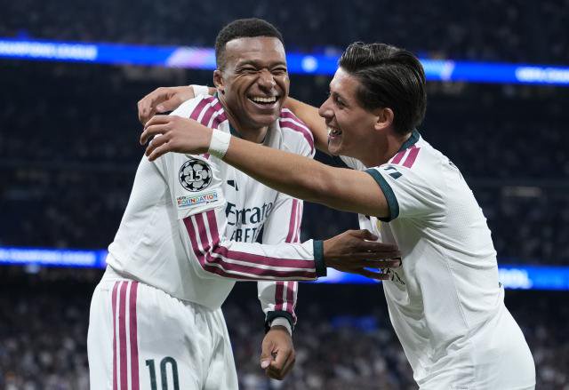 Real Madrid players celebrating.