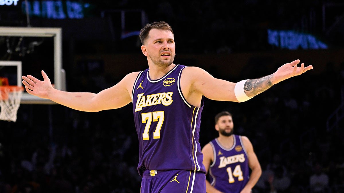 Guard Luka Doncic of the Los Angeles Lakers reacts after a foul call in the first half of an NBA basketball game against the Los Angeles Clippers at Crypto.com Arena in Los Angeles on Tuesday, Nov. 25, 2025.