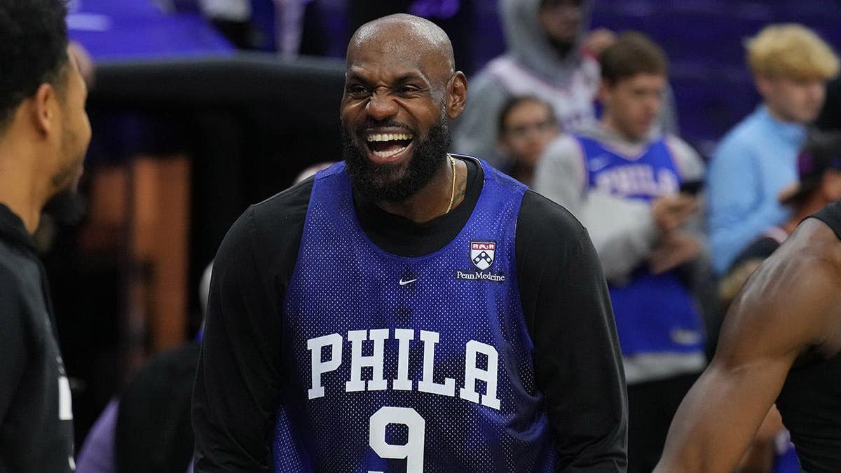 LeBron James smiles during practice at Wells Fargo Center in Philadelphia.