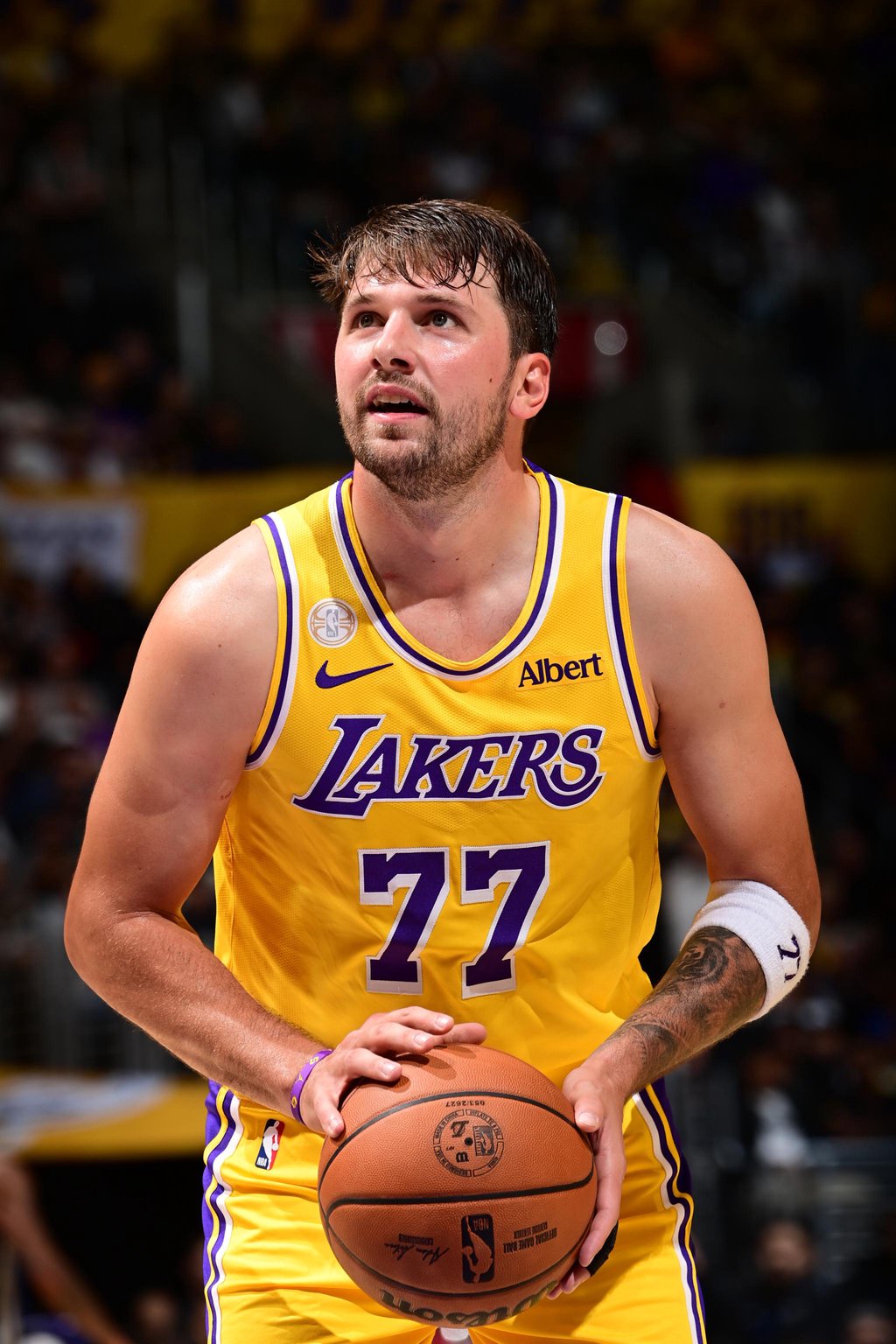 Luka Doncic (77) of the Los Angeles Lakers prepares to shoot a free throw during a game against the Golden State Warriors at Crypto.Com Arena in Los Angeles, California, Wednesday, Oct. 21, 2026.