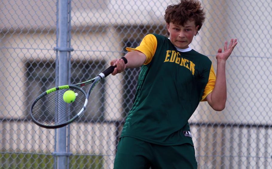 Caden Crow hits a forehand.