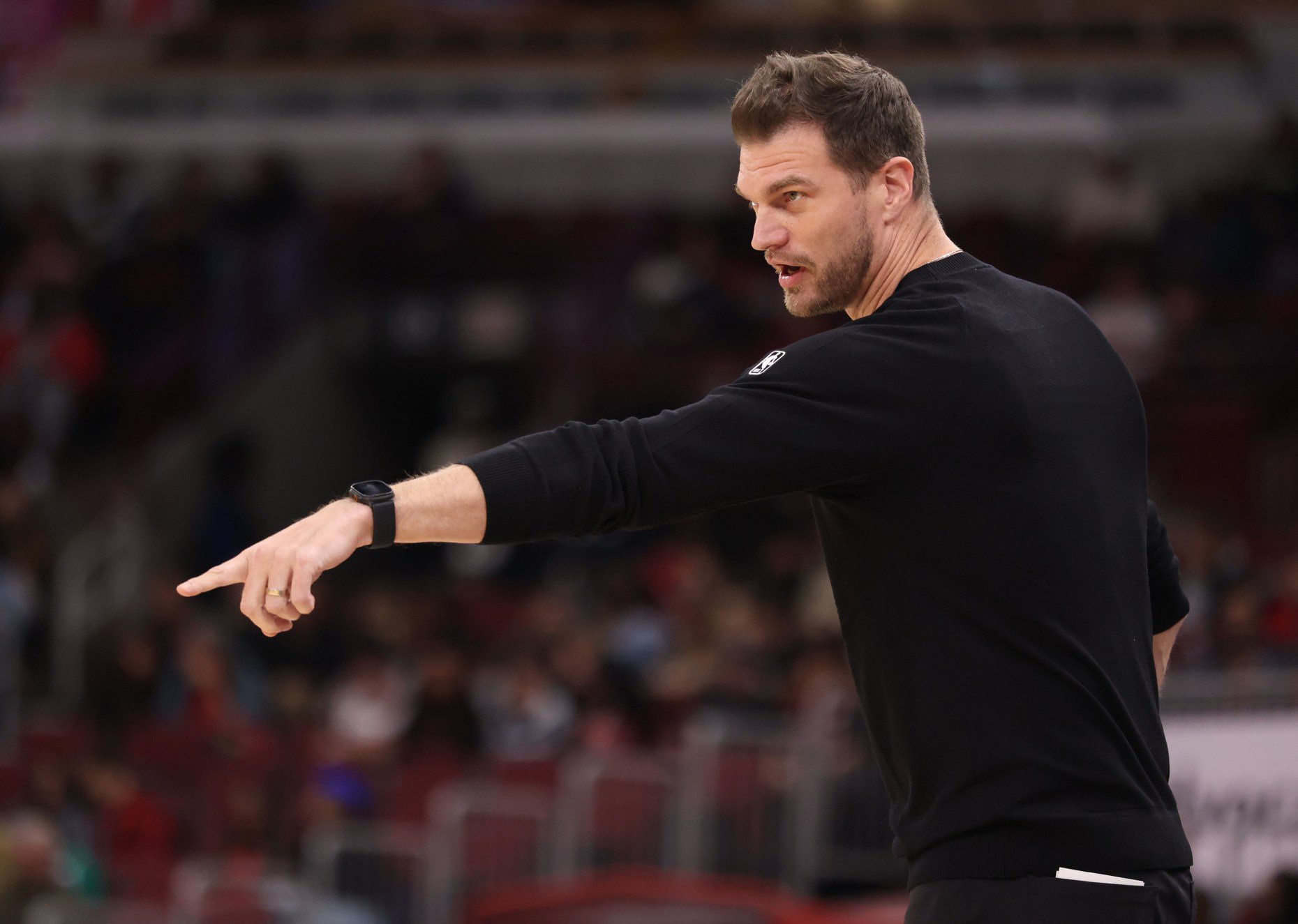 Bulls head coach Tiago Splitter points while talking to players in the second quarter against the Timberwolves in a preseason game at the United Center on Oct. 16, 2026, in Chicago. (John J. Kim/Chicago Tribune)
