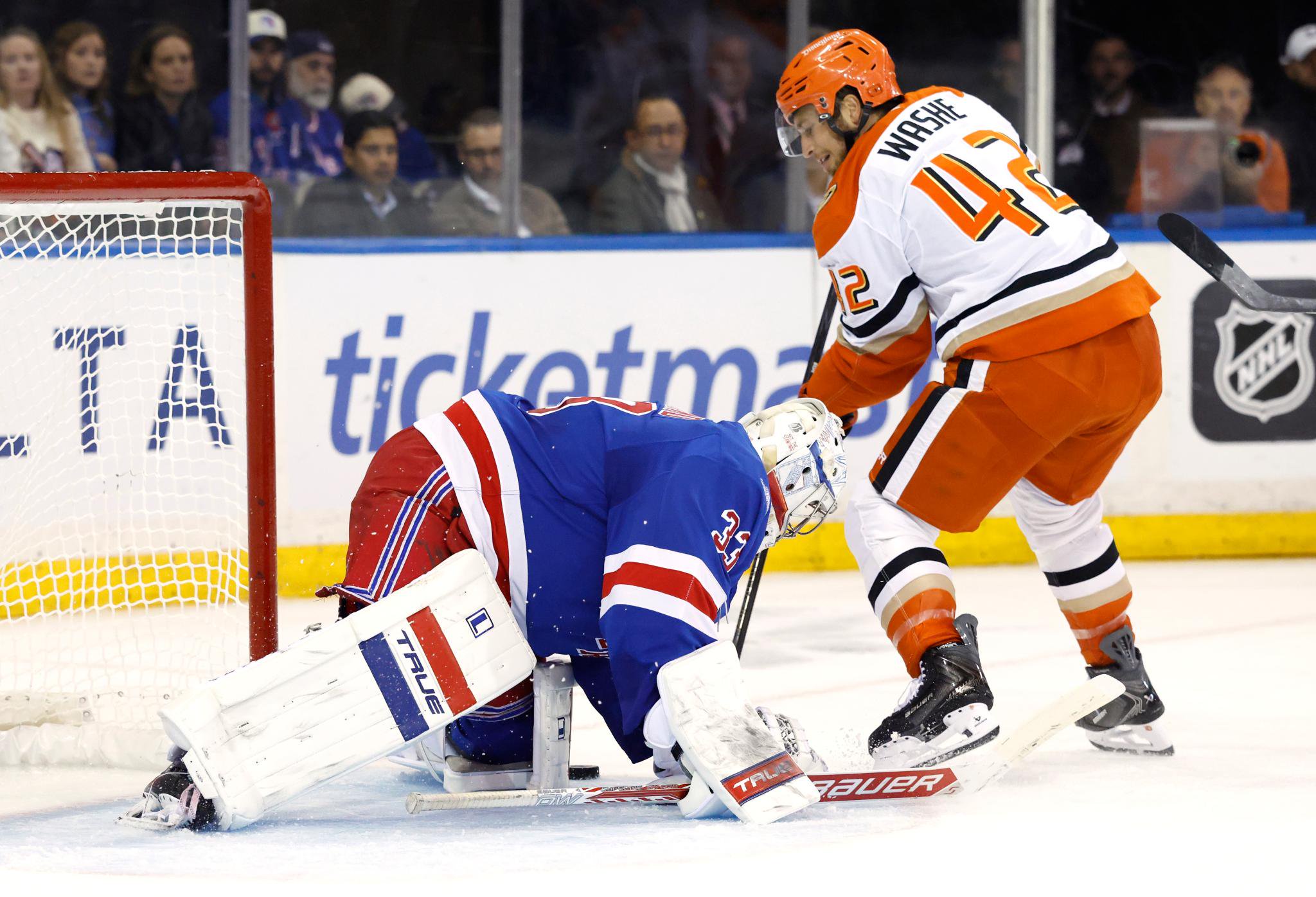 Dylan Garand defends the net against Tim Washe during the second period of the Rangers' win over the Ducks on Oct. 19, 2026 at Madison Square Garden.