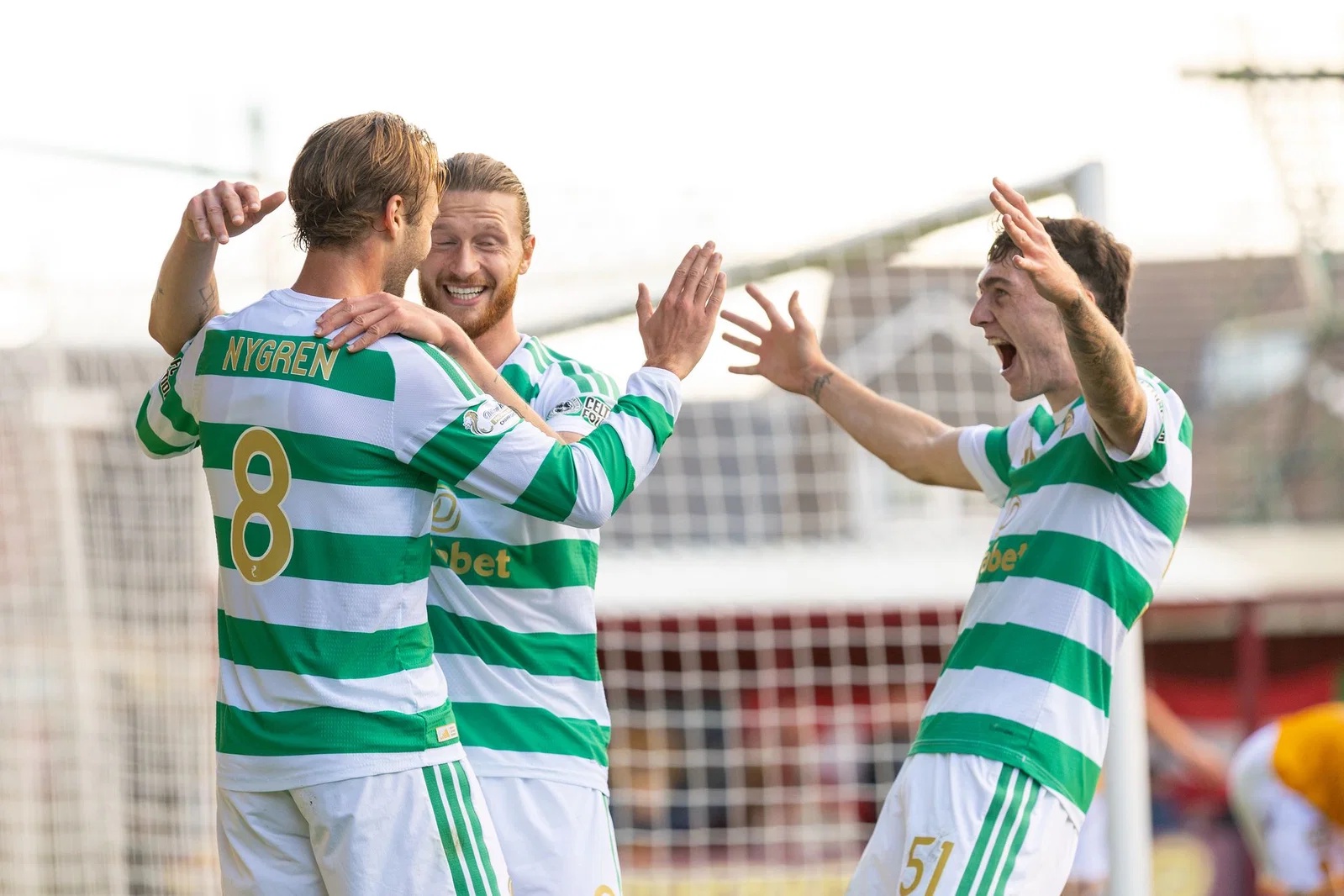 Benjamin Nygren is congratulated by Celtic team-mates
