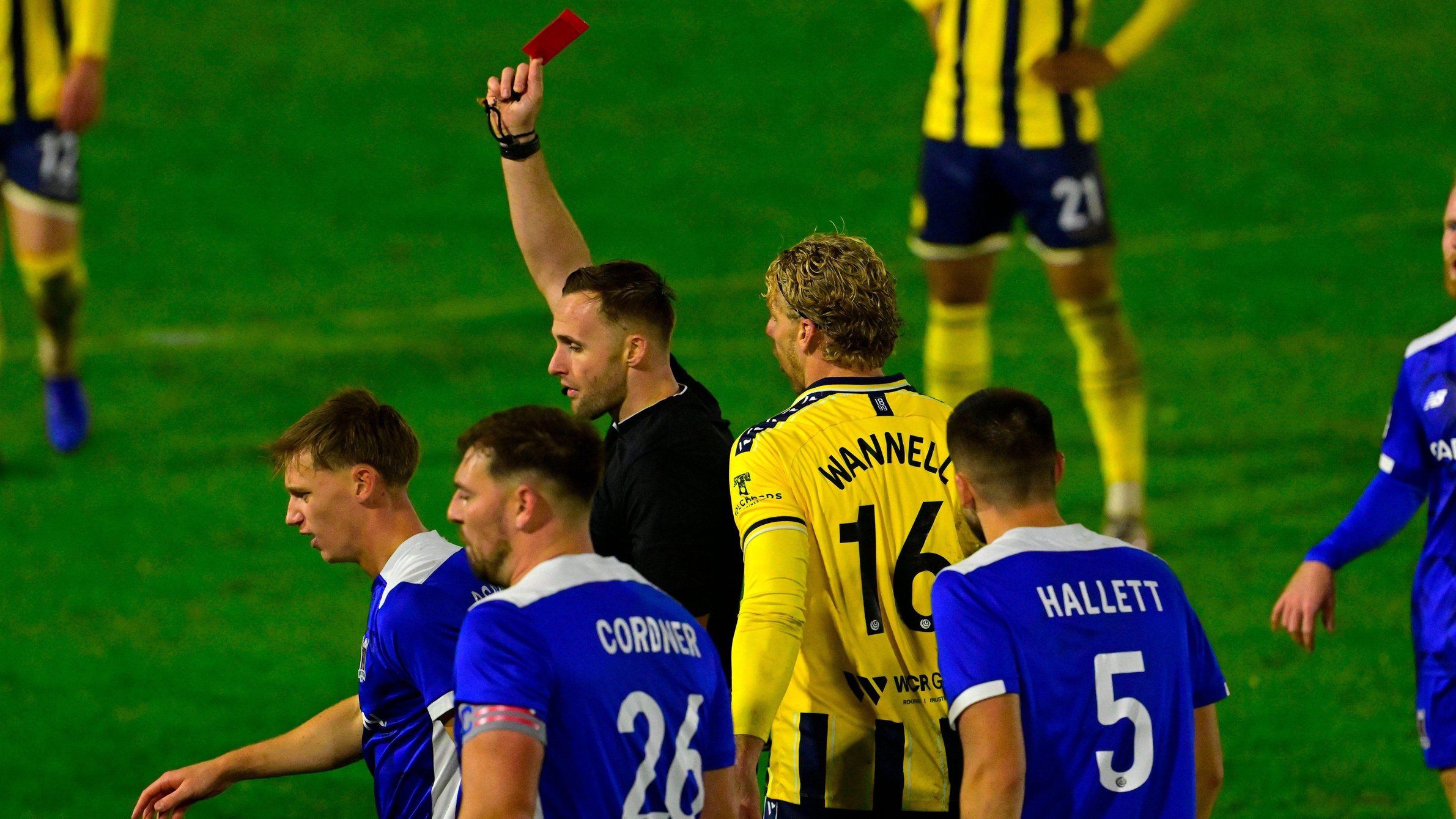 Jake Wannell is shown the red card