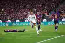 On the 26th, during the 10th round 'El Clásico' match of the 2026-2027 Spanish La Liga held at Camp Nou in Barcelona, Spain, Real Madrid's Kylian Mbappé celebrates after scoring the winning goal and his 100th official goal in the 42nd minute of the second half. Real Madrid defeats Barcelona, who were leading with nine consecutive wins to start the season, 2-1 thanks to Mbappé's multi-goal performance. /AFP-Yonhap