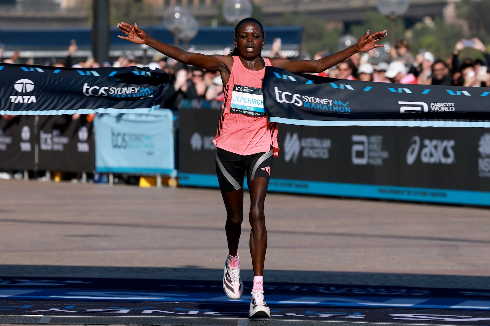 Kenya's Peres Jepchirchir celebrates as she crosses the finish line to win the the Sydney Marathon in August. Photograph: David Gray/AFP via Getty Images