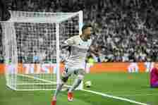 Joselu celebrates as his late brace completed an unlikely Real Madrid...