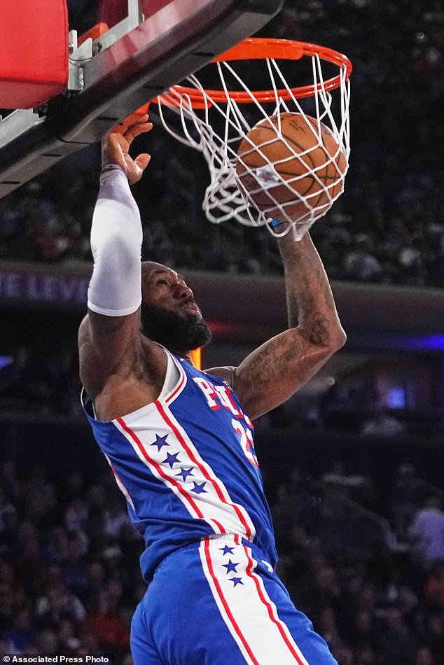 Philadelphia 76ers forward LeBron James dunks during the second half of an NBA basketball game against the New York Knicks Tuesday, Oct. 20, 2026, in New York. (AP Photo/Frank Franklin II)