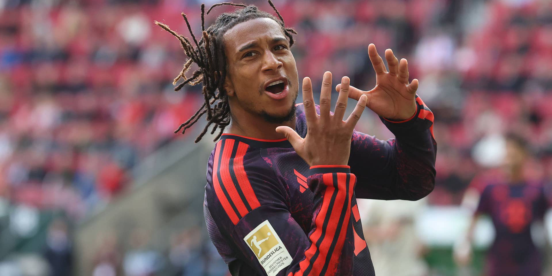AUGSBURG, GERMANY - OCTOBER 10: Michael Olise of FC Bayern Munich reacts during the Bundesliga 2026/27 match between FC Augsburg and FC Bayern München at WWK Arena on October 10, 2026 in Augsburg, Germany. (Photo by Alexander Hassenstein/Getty Images)