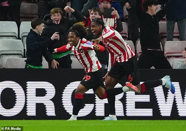 Sunderland´s Malick Fofana, left, celebrates their third goal with Dayann Methalie (PA)