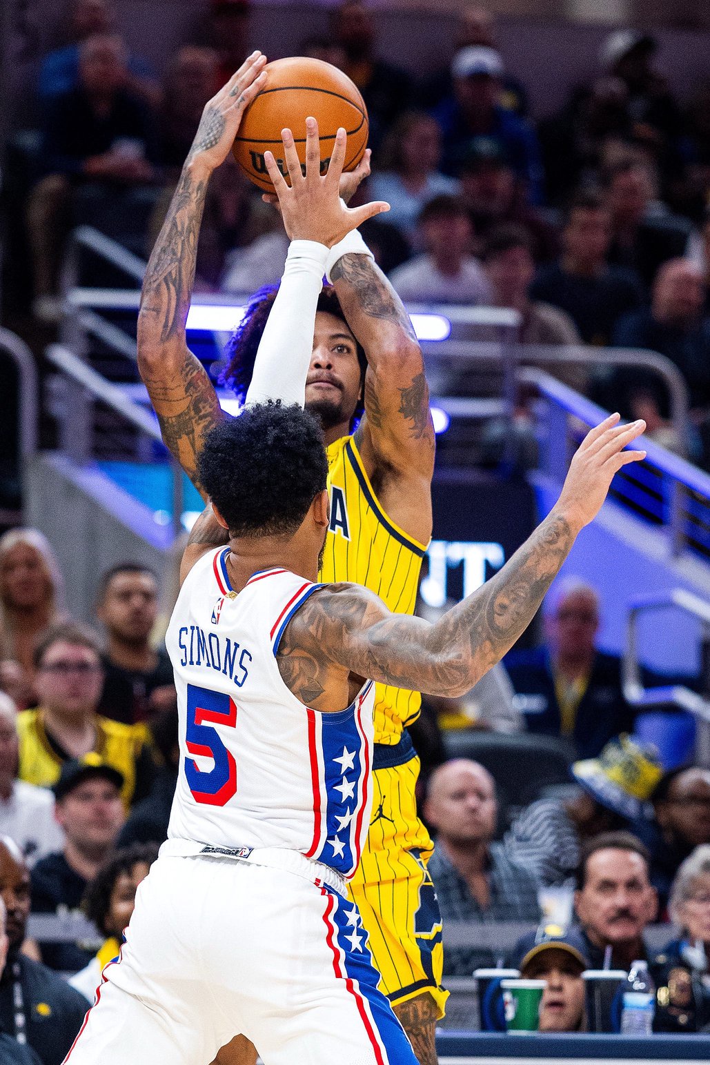 Oct 28, 2026; Indianapolis, Indiana, USA;  Indiana Pacers guard Kelly Oubre Jr. (10) shoots the ball while Philadelphia 76ers guard Anfernee Simons (5) defends in the first half at Gainbridge Fieldhouse.  Mandatory Credit: Trevor Ruszkowski-Imagn Images