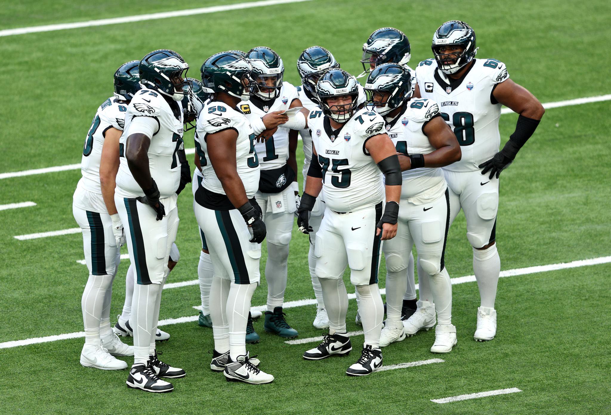 The Eagles huddle up.