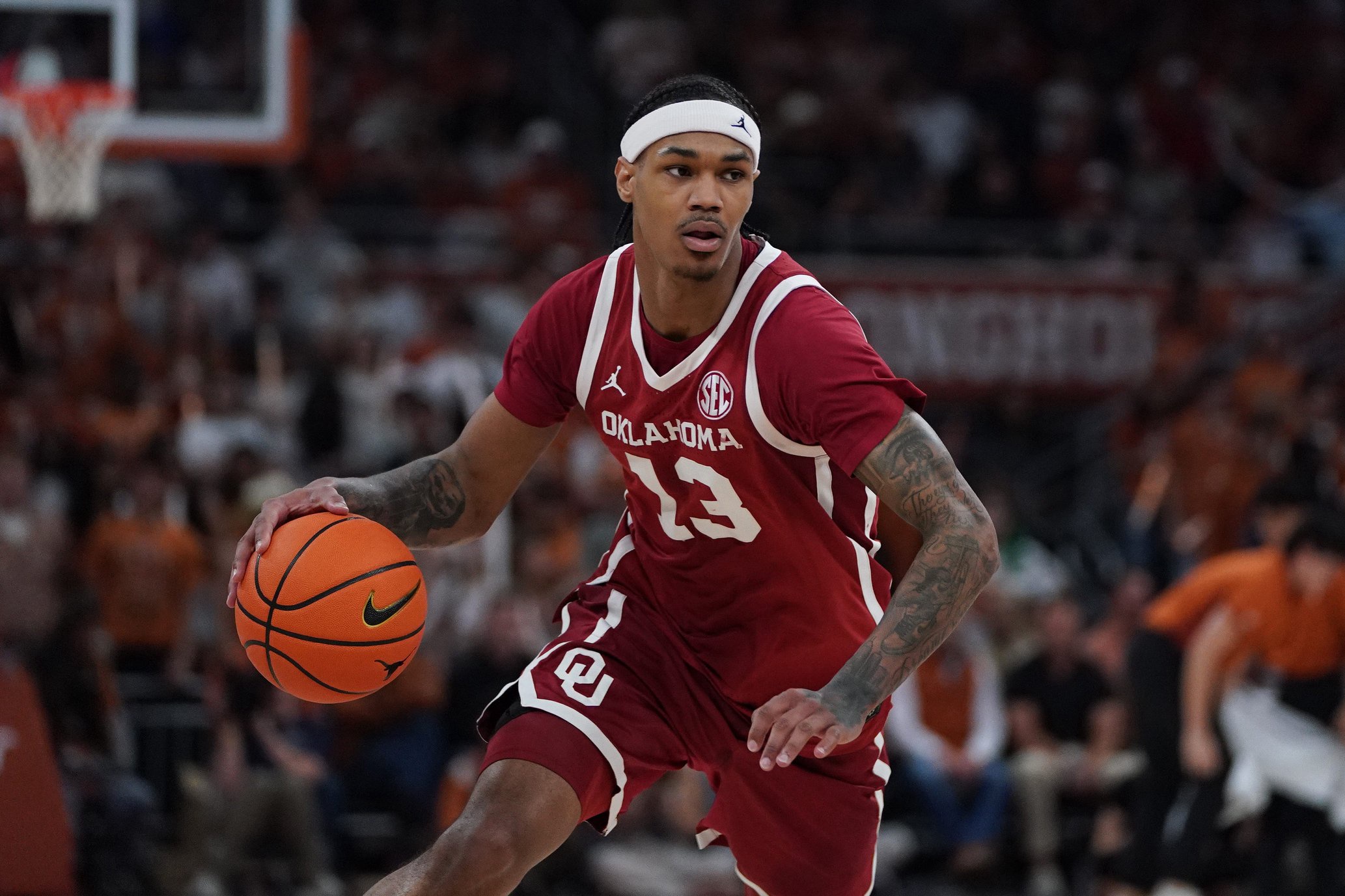 Mar 7, 2026; Austin, Texas, USA; Oklahoma Sooners forward Tae Davis (13) dribbles during the second half against the Texas Longhorns at Moody Center. Mandatory Credit: Dustin Safranek-Imagn Images