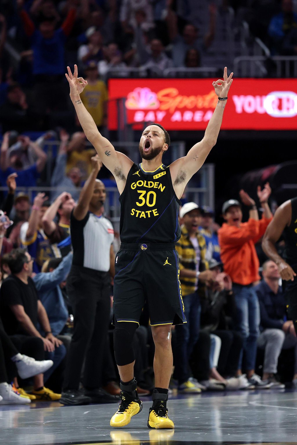 Stephen Curry of the Golden State Warriors reacts during a game against the Los Angeles Lakers.