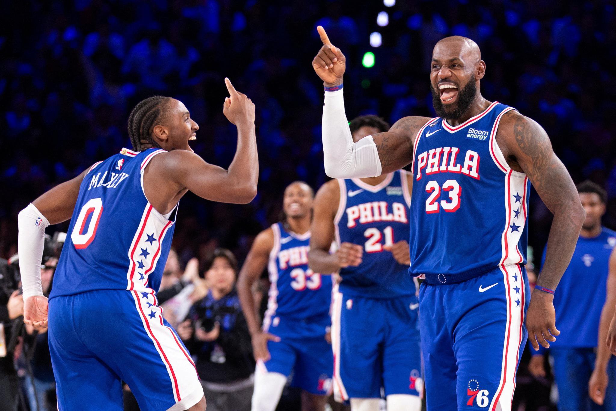 Philadelphia 76ers forward LeBron James (23) and Tyrese Maxey celebrate after a score against the Cleveland Cavaliers.