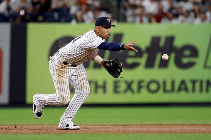New York Yankees shortstop Oswald Peraza #91 gets a forced play on a ball hit by Minnesota Twins center fielder Gilberto Celestino #67 during the 7th inning. 