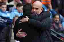 Manchester City manager Pep Guardiola and Arsenal manager Mikel Arteta embrace ahead of the Premier League match between Manchester City and Arsena...