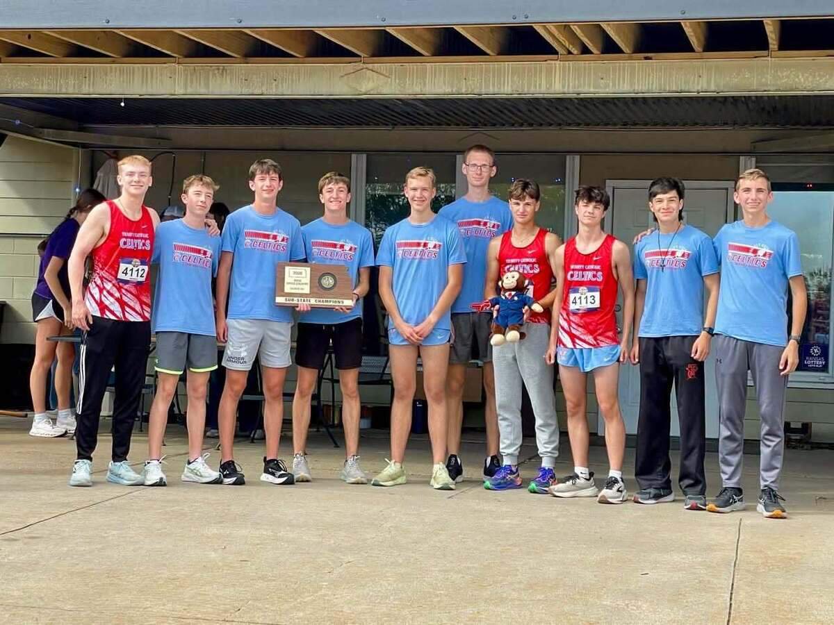 Hutchinson Trinity’s boys cross country team celebrates its second consecutive Class 2A state championship Saturday at Wamego Country Club, finishing with 108 points despite graduating six seniors from last year’s title team.