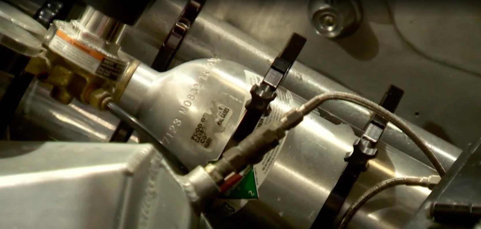 A close-up of a nitrous oxide tank installed inside Gary Matranga's record-breaking vehicle.