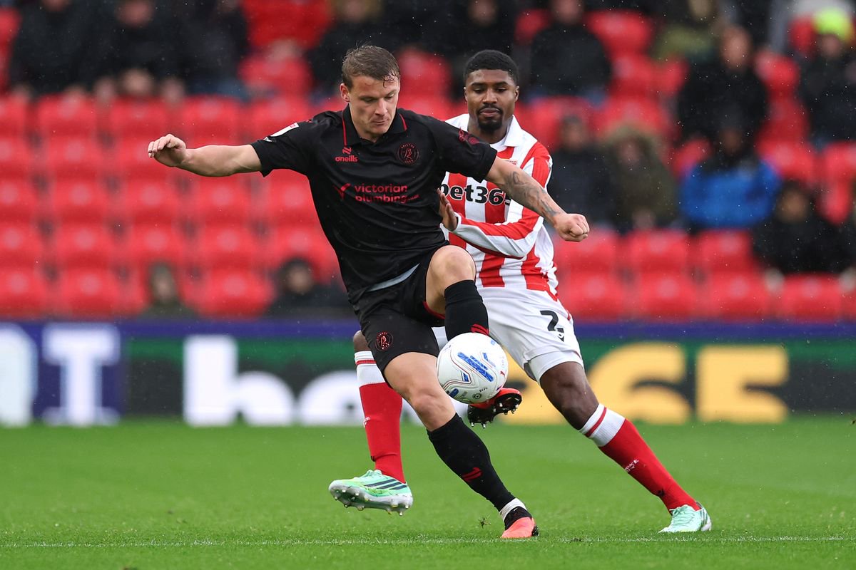 Ben Johnson tries to get the ball from Cameron Pring.