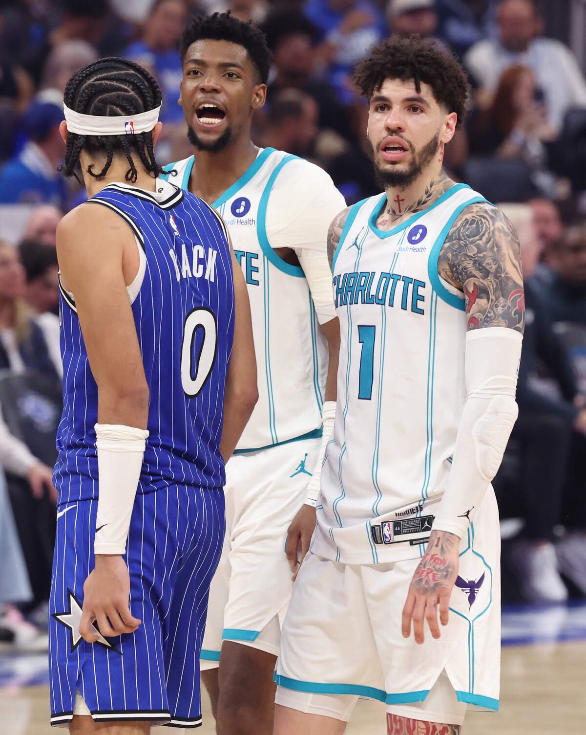 Charlotte Hornets guards Brandon Miller, left and LaMelo Ball, right, during action against the Orlando Magic at Kia Center in Orlando, FL on Friday, April 17, 2026. The Magic defeated the Hornets 121-90.