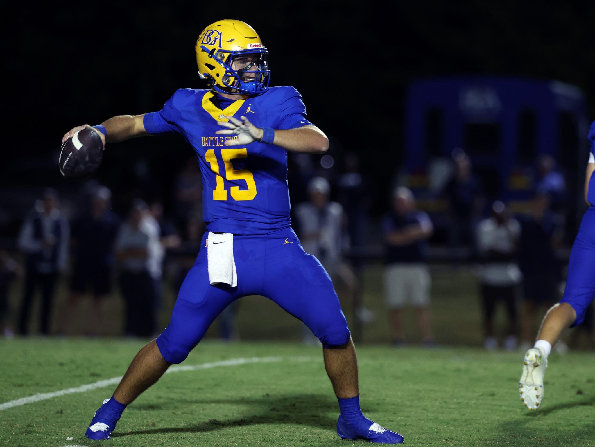 Battle Ground Academy quarterback Bo Bryan (15) prepares to pass the ball during a game against Franklin Road Academy.