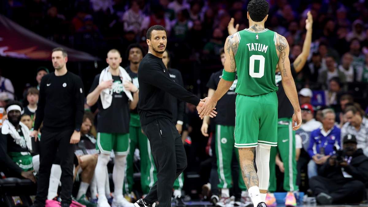 Boston Celtics head coach Joe Mazzulla high fives Jayson Tatum
