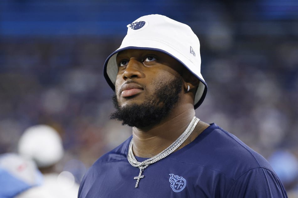 JC Latham of the Tennessee Titans looks on during the second half of the NFL Preseason 2025 game against the Minnesota Vikings at Nissan Stadium on August 22, 2025.
