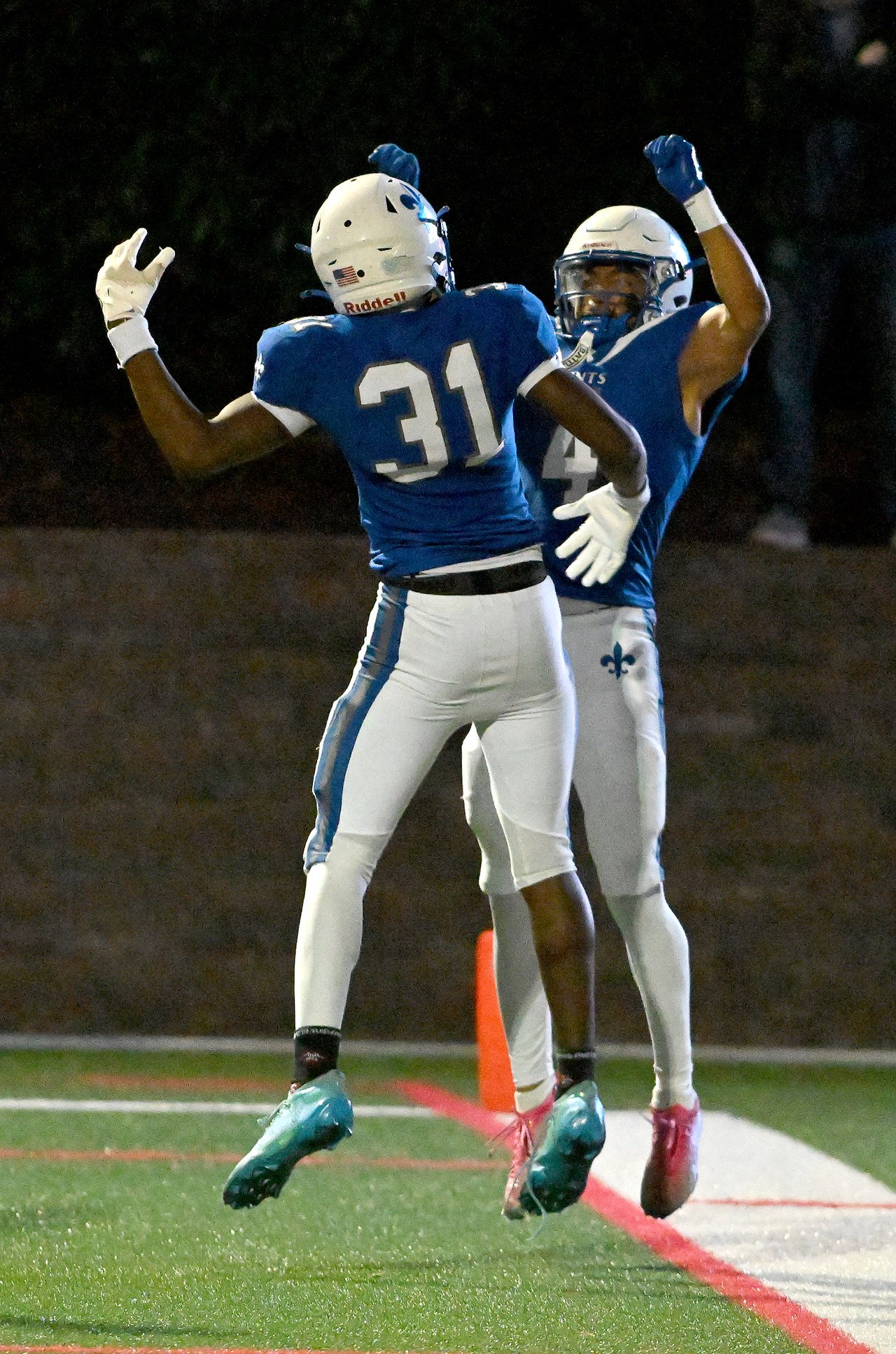 St. Mary's Saints Dylin Jackson #4 celebrates a touchdown during the second quarter.  The Archbishop Spalding Cavaliers visit the St. Mary\xe2\x80\x99s Saints in a high school football matchup Friday evening. (Paul W. Gillespie/Staff)