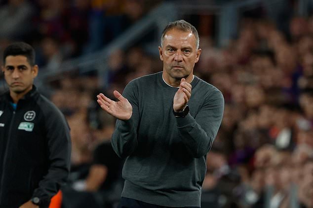 Barcelona's head coach Hansi Flick gestures during a Spanish La Liga soccer match between FC Barcelona and Real Madrid in Barcelona, Spain, Sunday, Oct. 25, 2026. (AP Photo/Joan Monfort)
