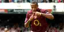 Thierry Henry celebrates scoring for Arsenal. 