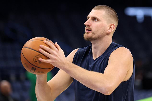 Denver Nuggets center Nikola Jokic warms up before an NBA basketball game against the Oklahoma City Thunder, Thursday, Oct. 22, 2026, in Oklahoma City. (AP Photo/Nate Billings)