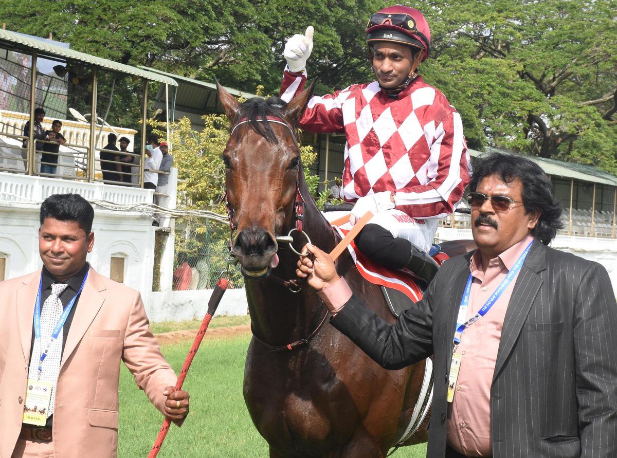 Sprinters’ Cup winner Rieko (Akshay Kumar up) being led in by owner P. Arun Kumar, right, and trainer S. John
