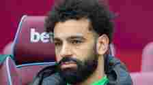 An unhappy looking Liverpool forward Mohamed Salah (11) on the bench during the Premier League match between West Ham United and Liverpool