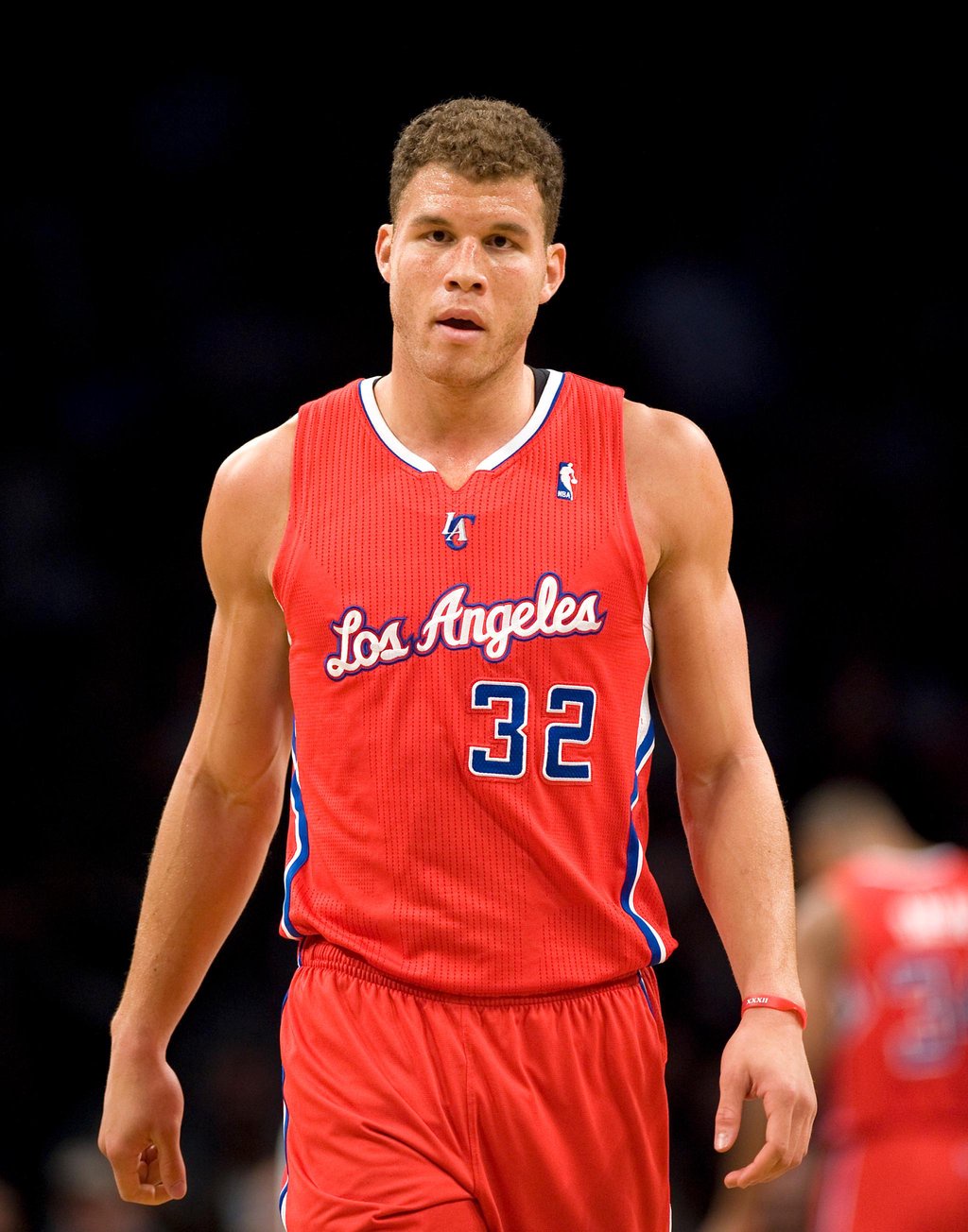 Basketball player Blake Griffin wearing a red Los Angeles Clippers uniform with number 32.