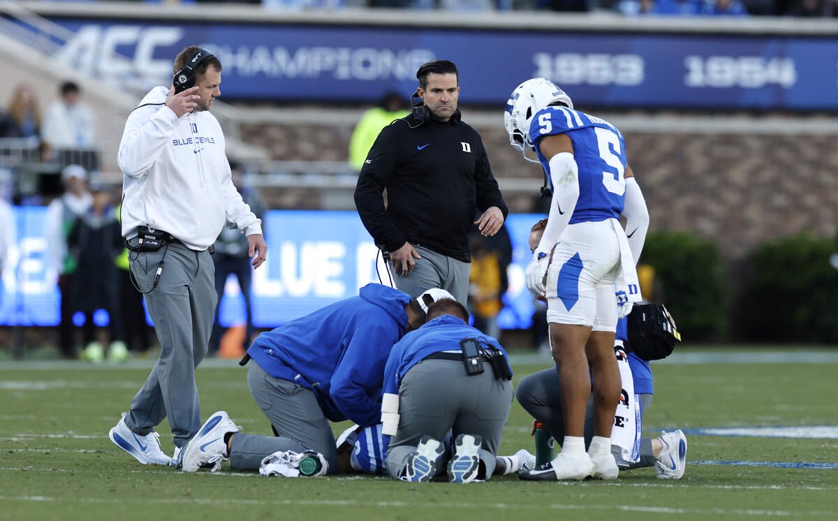 Duke cornerback Kimari Robinson (5) watches as staff attend to Dashawn Stone in second half of UNCÕs 24-20 victory over Duke at Wallace Wade Stadium in Durham, N.C., Saturday, Oct. 17, 2026.