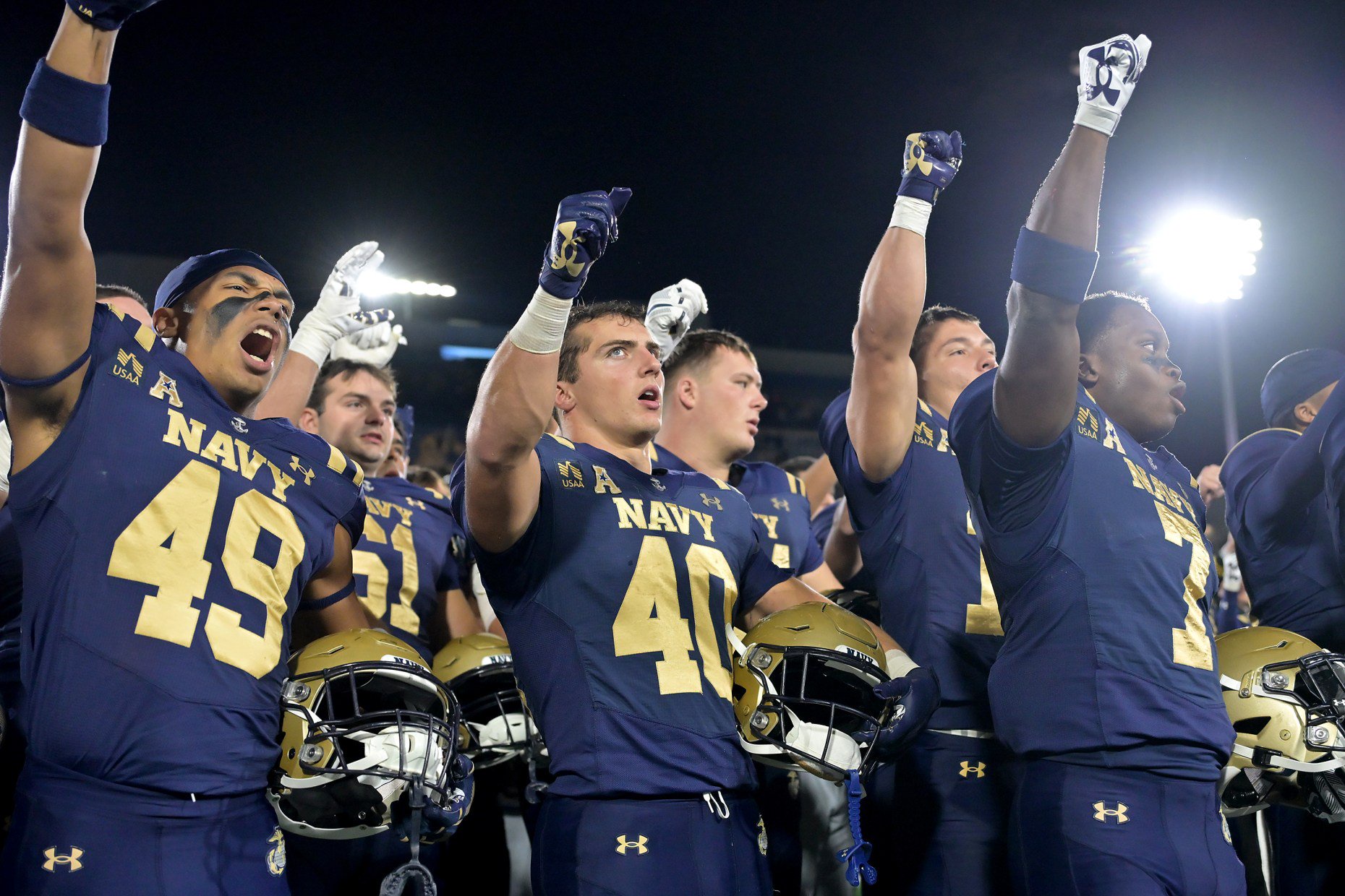 Navy chants "Beat Army" after the playing of Navy Blue and Gold. The visiting North Texas Mean Green defeat the Navy Midshipmen, 49-39, in an NCAA football game Saturday at Navy-Marine Corps Memorial Stadium in Annapolis. (Paul W. Gillespie/Staff)