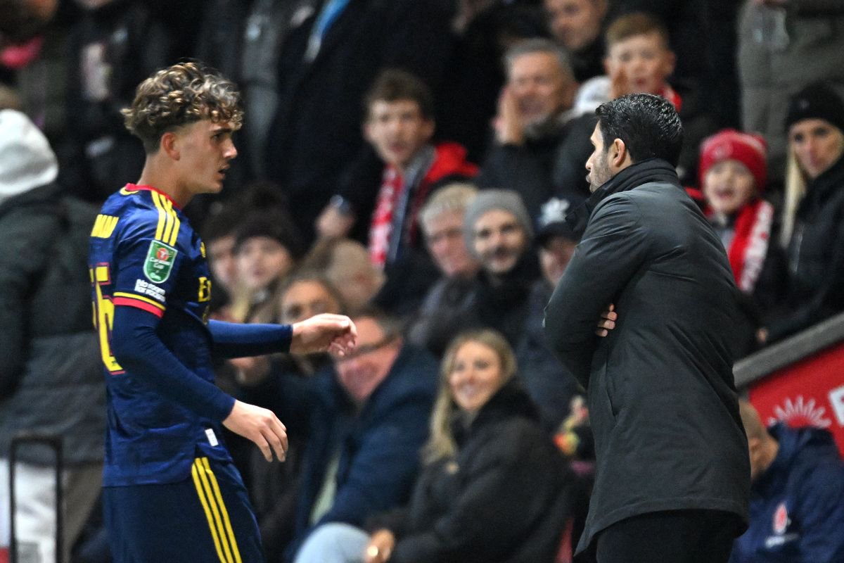 Mikel Arteta, Manager of Arsenal, talks to Max Dowman of Arsenal as he walks off the pitch after being sent off during the Carabao Cup Fourth Round match between Fleetwood Town and Arsenal at Highbury Stadium on October 27, 2026 in Fleetwood, England