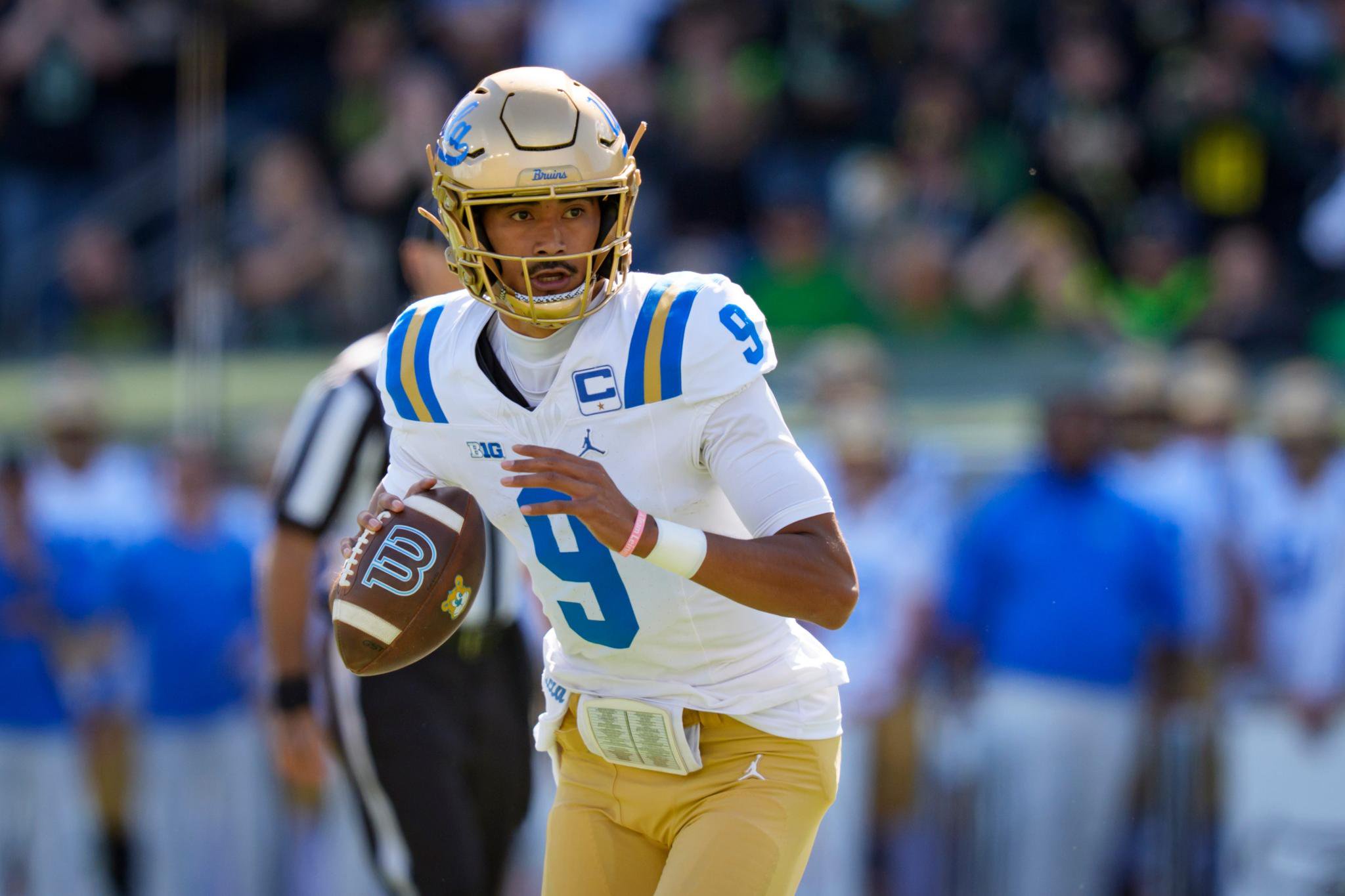 UCLA quarterback Nico Iamaleava prepares to throw a pass during a game against the Oregon Ducks.