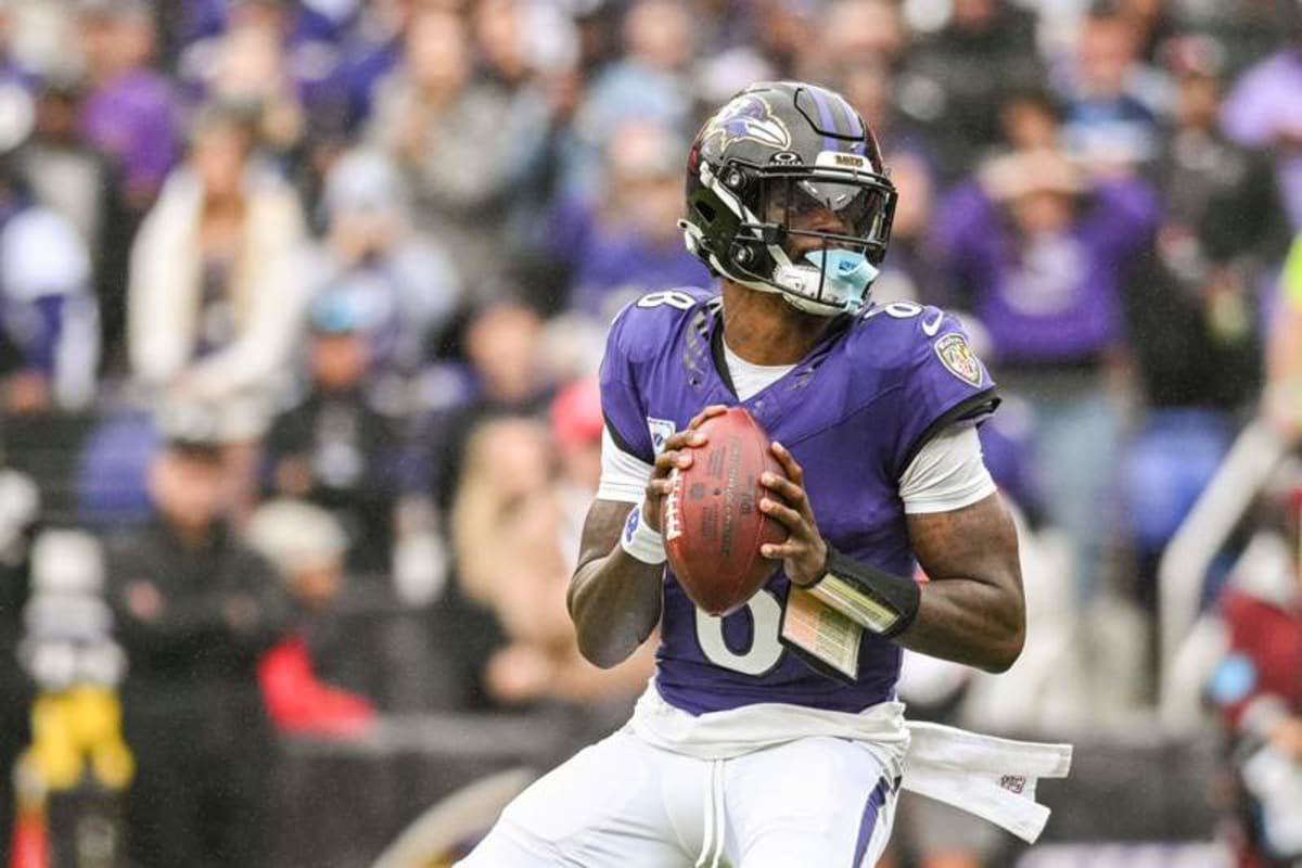 Oct 4, 2026; Baltimore, Maryland, USA; Baltimore Ravens quarterback Lamar Jackson (8) drops back to pass during the first half against the Tennessee Titans at M&T Bank Stadium. © Tommy Gilligan-Imagn Images