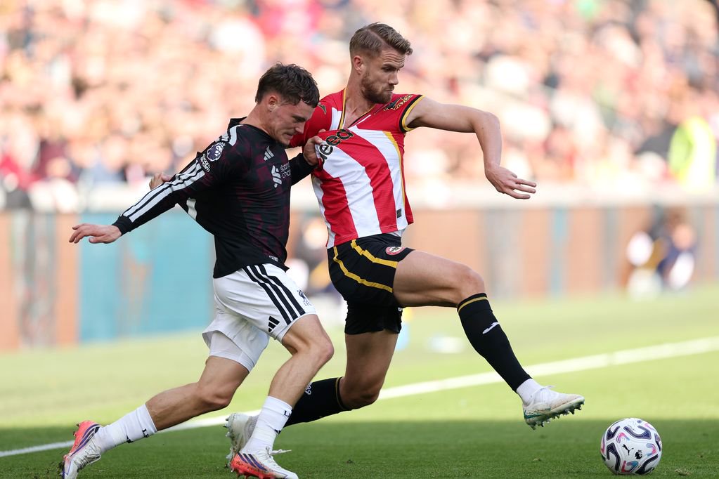Florian Wirtz battles Kristoffer Ajer during Brentford 1-2 Liverpool.