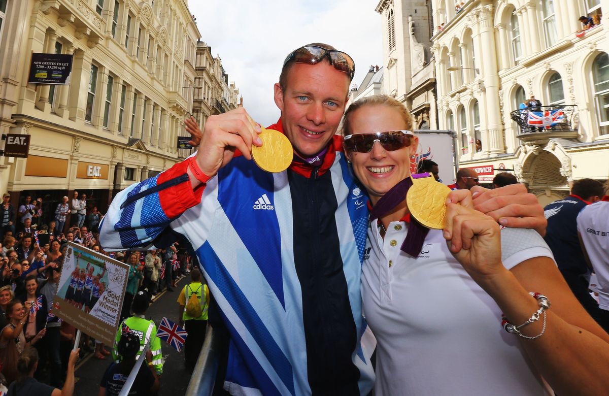 David Smith and Naomi Riches with Paralympic gold medals in 2012